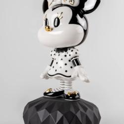 Lladro Minnie in black and white Sculpture  A porcelain sculpture portraying a contemporary vision of Minnie Mouse, one of the Disney factory’s best-loved characters. 01009707